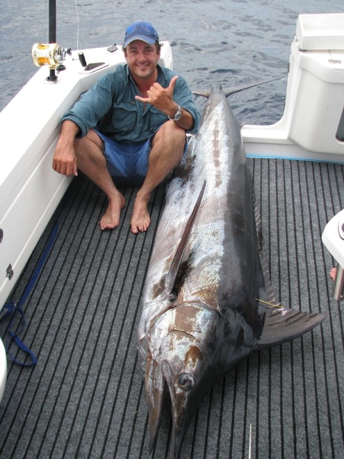 Looking like a winner and $20,000 richer was Mark Foy after taking the Isuzu Heaviest Marlin form the boat ’Seaka.’ © BlueWater Power Yachts